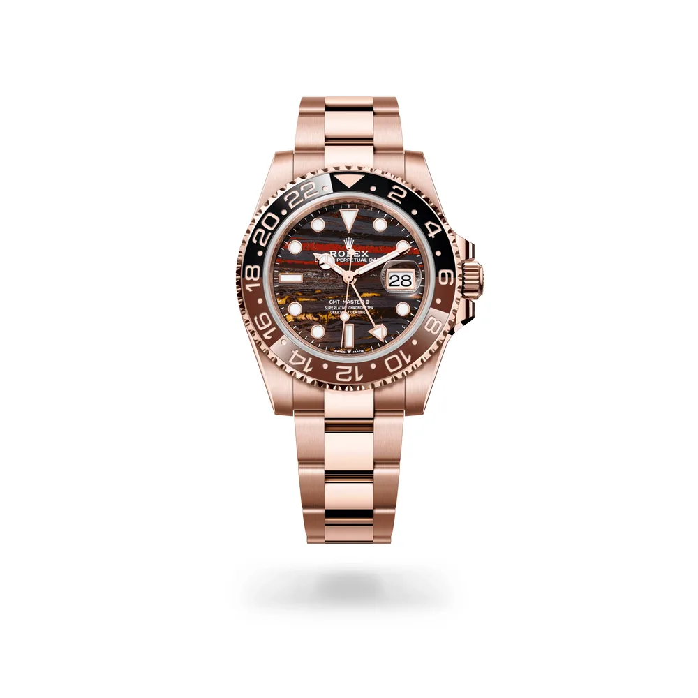 Rolex Oyster Perpetual GMT-Master II, 40 mm, 18 kt Everose gold, 18 kt Everose gold, Tiger iron (metamorphic rock with golden and orangey tints) dial