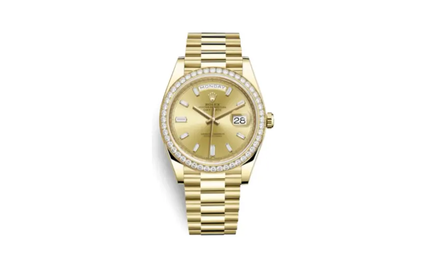 Rolex Day-Date 40 Yellow Gold / Diamond / Champagne - Baguette